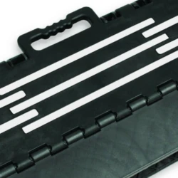 Black folding step stool with a handle and white non-slip strips.