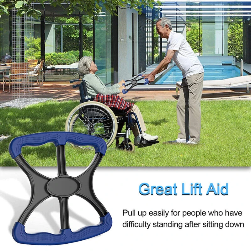 Elderly person in wheelchair using a manual stand aid with assistance.