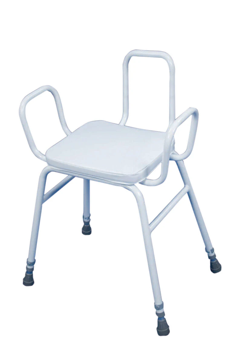 White perching stool with armrests and rubber-tipped legs.