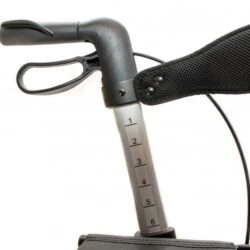 Close-up of rollator handle with height adjustment markings.