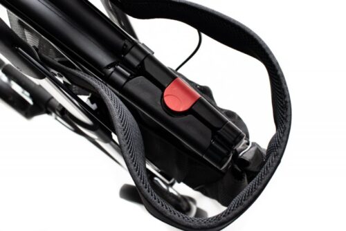 Close-up of folded Carbon Ultralight Rollator with red latch.