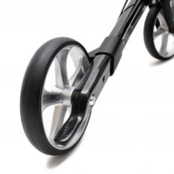 Close-up view of a carbon fiber rollator wheel with a sleek design.