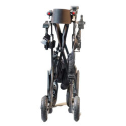 Folded electric rollator wheelchair in upright position.