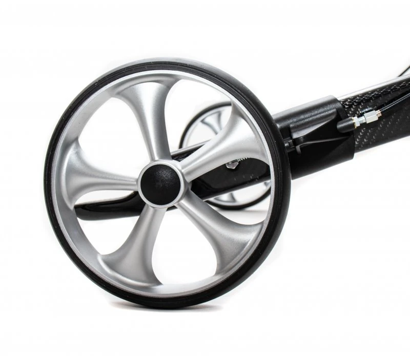 Close-up view of a Gepard Rollator wheel with a sleek silver design.