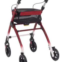 Red and white indoor rollator with tray and mesh bag.