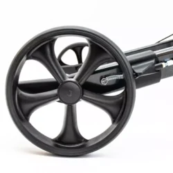 Close-up view of a black rollator wheel with a sturdy frame.