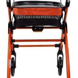 Rear view of an orange indoor rollator with a tray and four wheels.