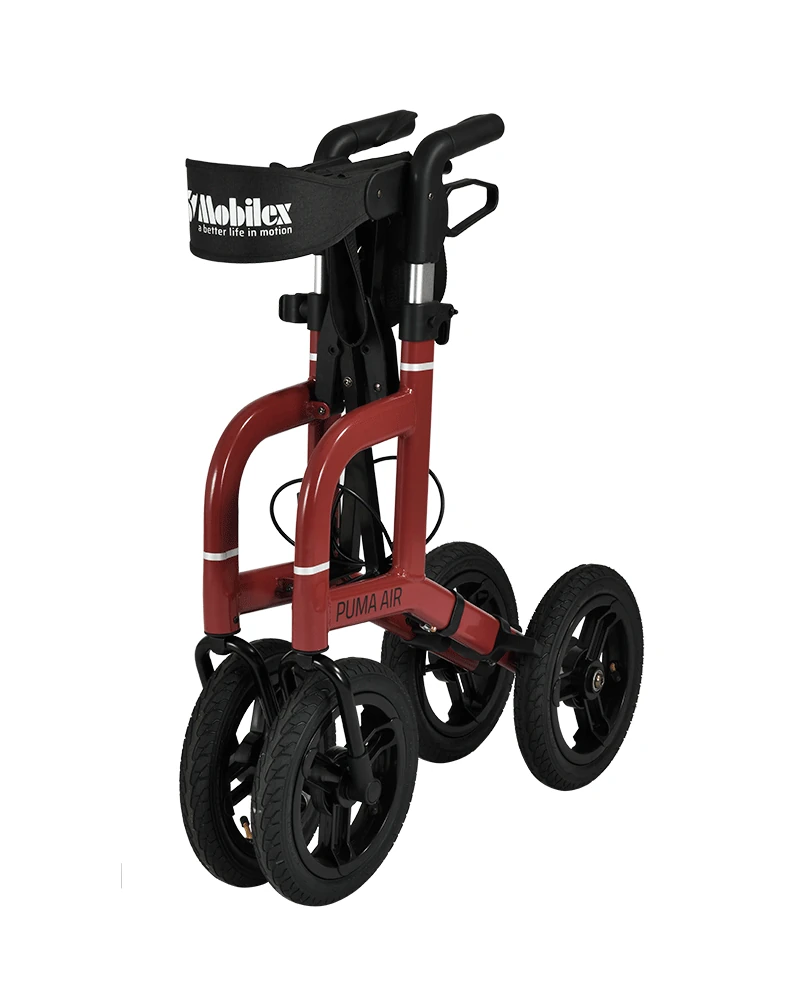Red Mobilex Puma Air rollator with large pneumatic tires and a black back belt.