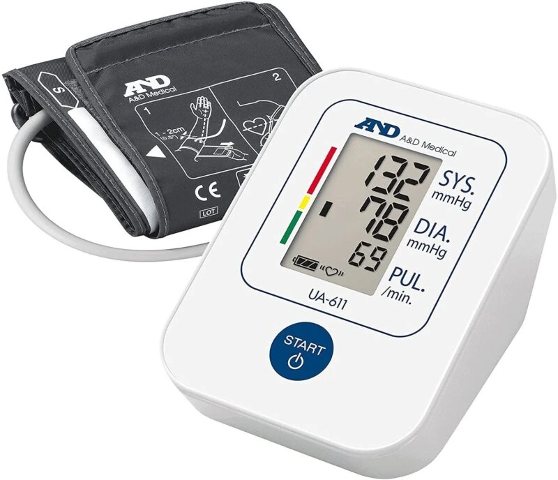 Digital blood pressure monitor with cuff and display showing readings.