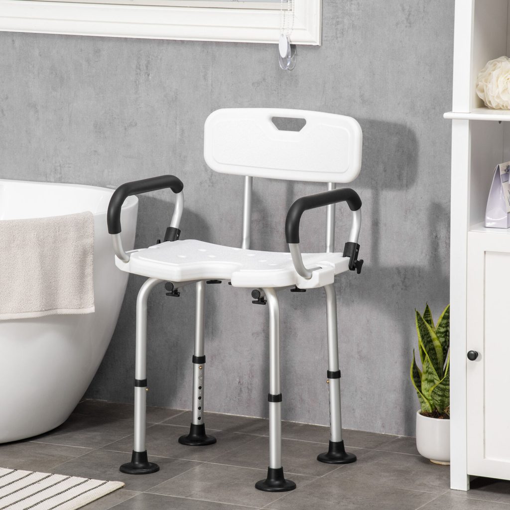 Height adjustable shower chair with padded armrests in a bathroom setting.