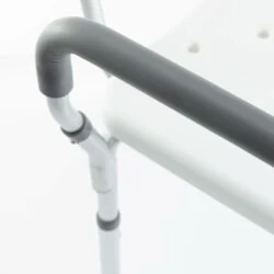 Close-up of a shower chair armrest with adjustable height.