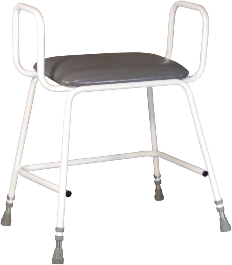 White perching stool with gray padded seat and armrests.