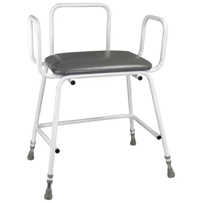 White frame stool with grey padded seat and armrests.