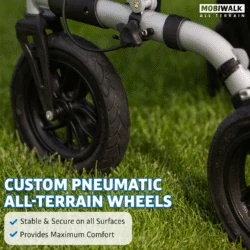 Close-up of MobiWalk rollator's pneumatic wheel on grass.