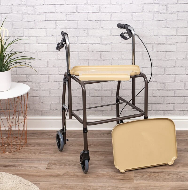 Indoor trolley with brakes and removable trays on a wooden floor.