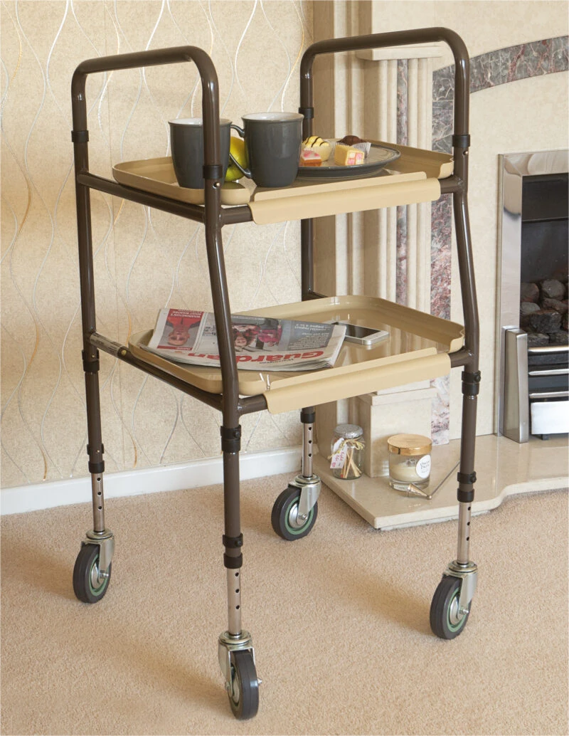 Height adjustable indoor trolley with two trays and wheels.