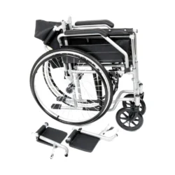 Folded self propelled wheelchair with detached footrests.