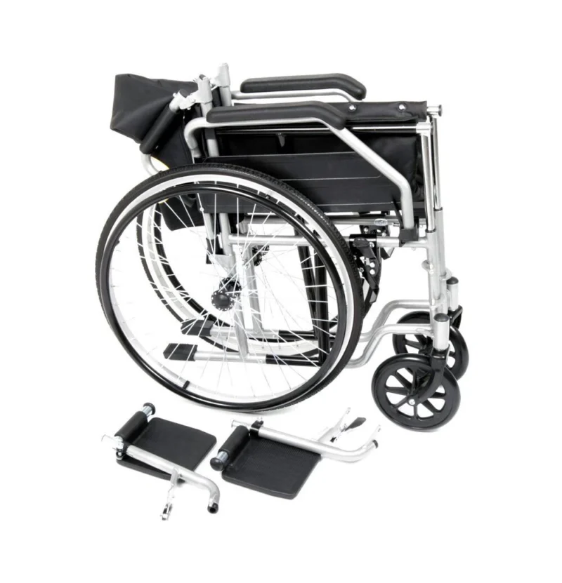 Folded self propelled wheelchair with detached footrests.
