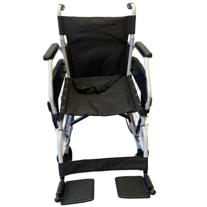 Front view of a black folding self propelled wheelchair with footrests.