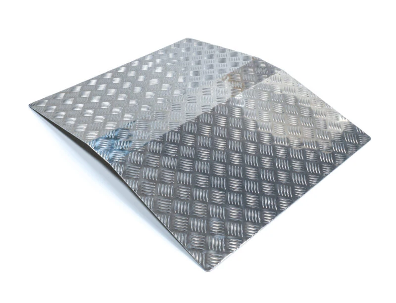 Aluminium bridge ramp with checker plate surface.