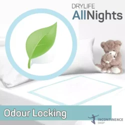 Incontinence bed pad on a bed with a teddy bear, featuring odour locking text.