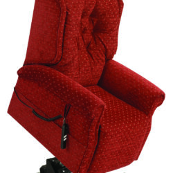 Red recliner chair in lifted position with a remote control.