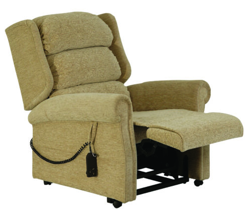 Beige recliner chair with extended footrest and remote control.