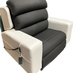 Black and white custom riser recliner chair with remote control.
