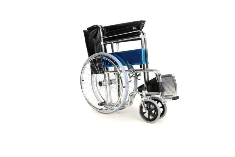 Folding steel wheelchair with blue seat and flip up foot rests.