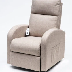 Oat-colored rise and recline chair with remote and side pocket.