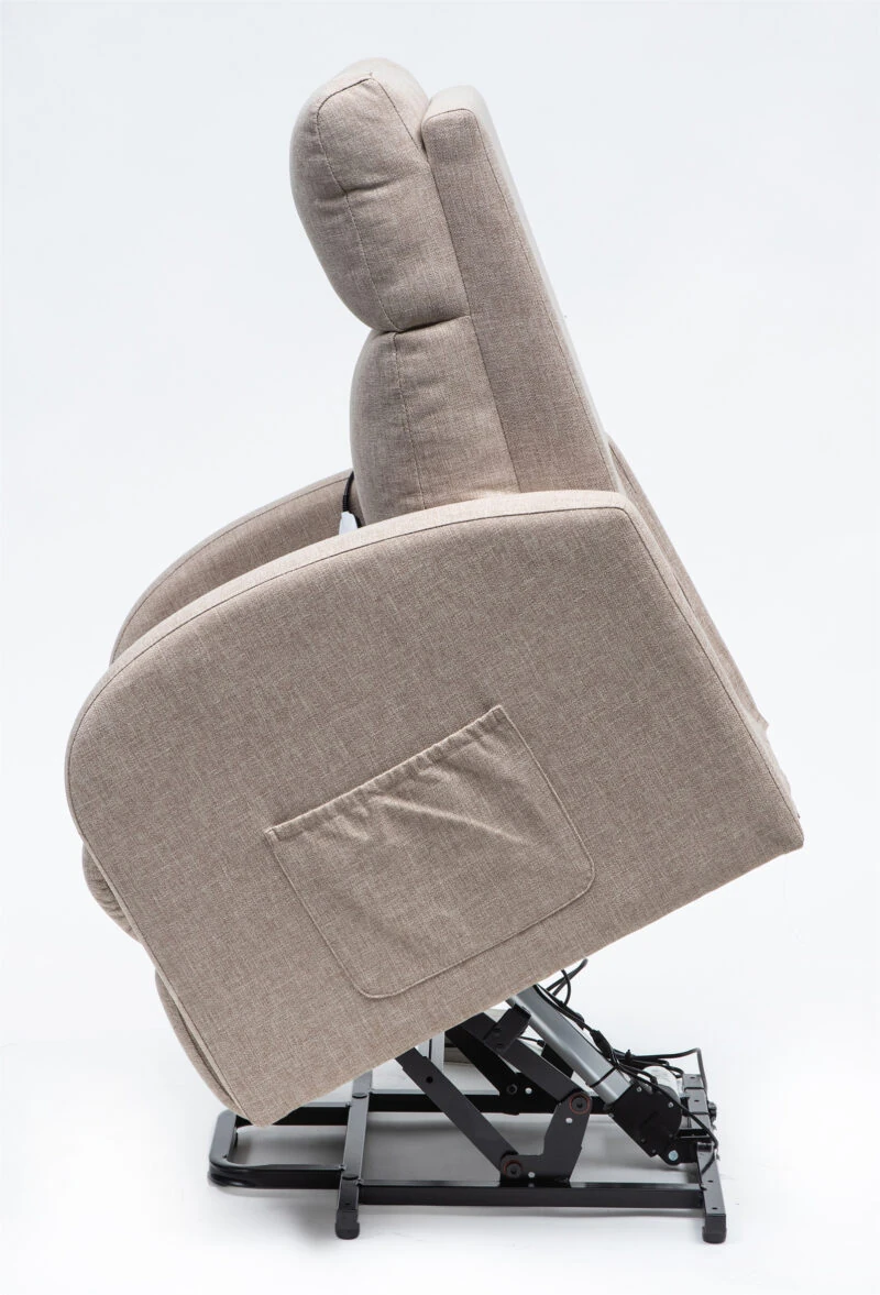 Side view of a beige rise and recline chair in a lifted position.