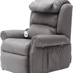 Grey recliner armchair with remote control on the armrest.