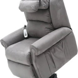 Grey recliner armchair with remote control on armrest.