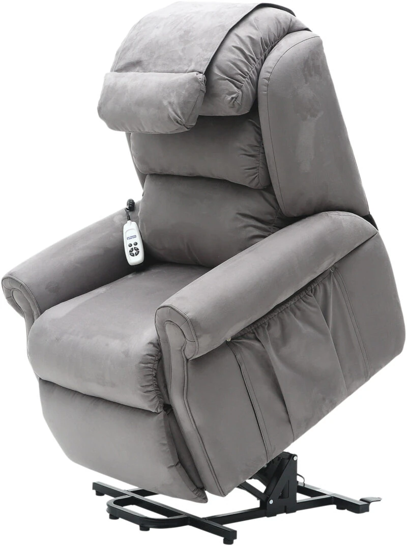 Grey recliner armchair with remote control on armrest.