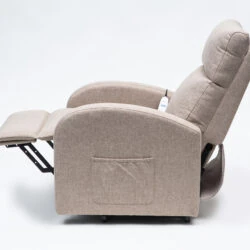 Side view of an oat-colored rise and recline chair with footrest extended.