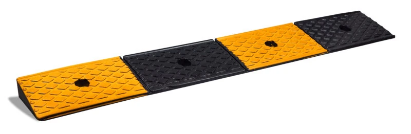 Rubber threshold ramp with alternating yellow and black sections.