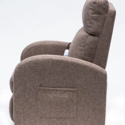 Side view of a mink-colored rise and recline chair with side pocket.