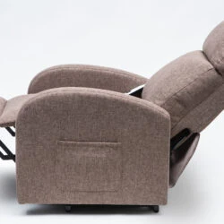 Mink-colored rise and recline chair in a reclined position.
