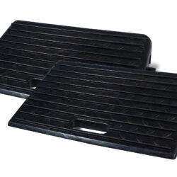 Two black rubber threshold ramps with textured surface and handle cutouts.