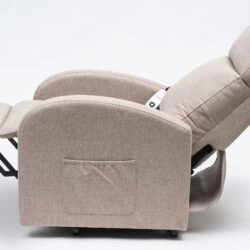 Oat-colored recline chair in a reclined position with side pocket.