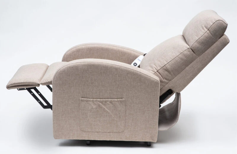 Oat-colored recline chair in a reclined position with side pocket.