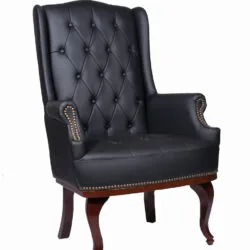 Black high back armchair with button-tufted design and mahogany legs.