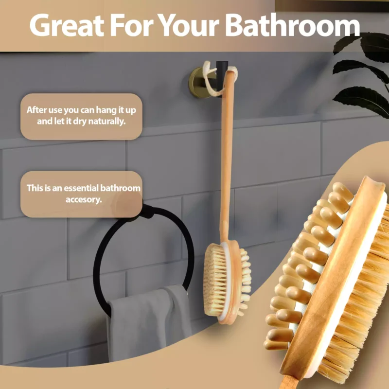 Long handled shower cleaning brush hanging in a bathroom.