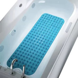 Blue anti slip shower mat placed inside a white bathtub.