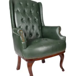 Antique green high back armchair with dark mahogany legs.