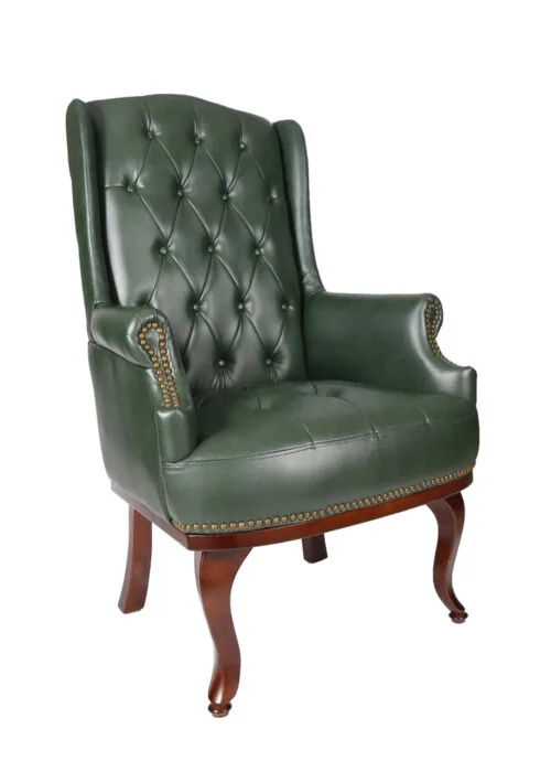 Antique green high back armchair with dark mahogany legs.