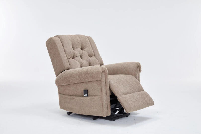 Brown electric recliner chair with a buttoned backrest and extended footrest.