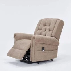 Brown electric riser recliner chair with footrest extended.