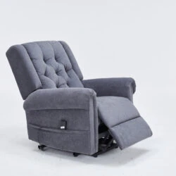 Grey recliner chair with extended footrest on a white background.
