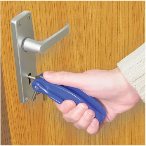 Hand using a blue key turner to unlock a door.